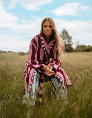 Luxury cotton bath robe for a relaxing evening routine before sleep in a calm outdoor setting