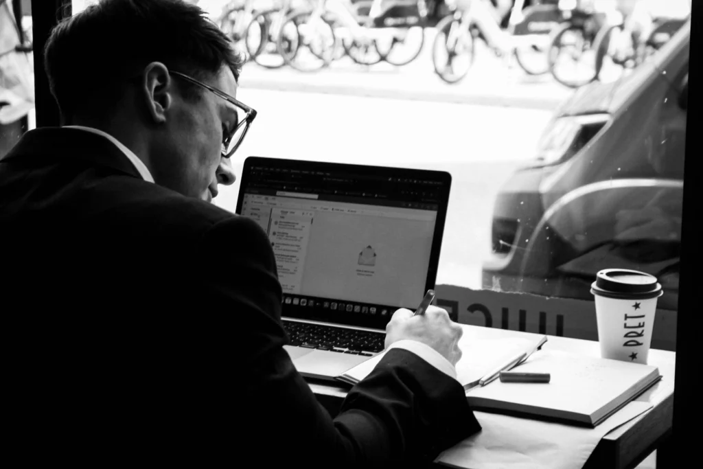 Sleep hacks for busy professionals: working late on a laptop can increase stress and disrupt healthy sleep routines